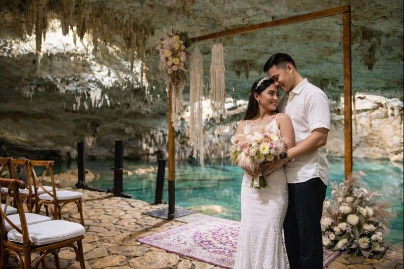 Cenote destination wedding ceremony at a resort in Mexico